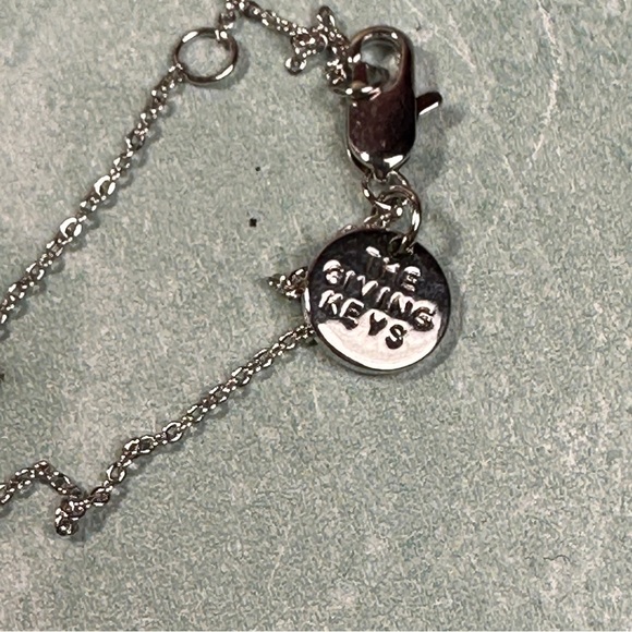 The Giving Trees Believe dainty tiny silver key charm - Picture 2 of 5